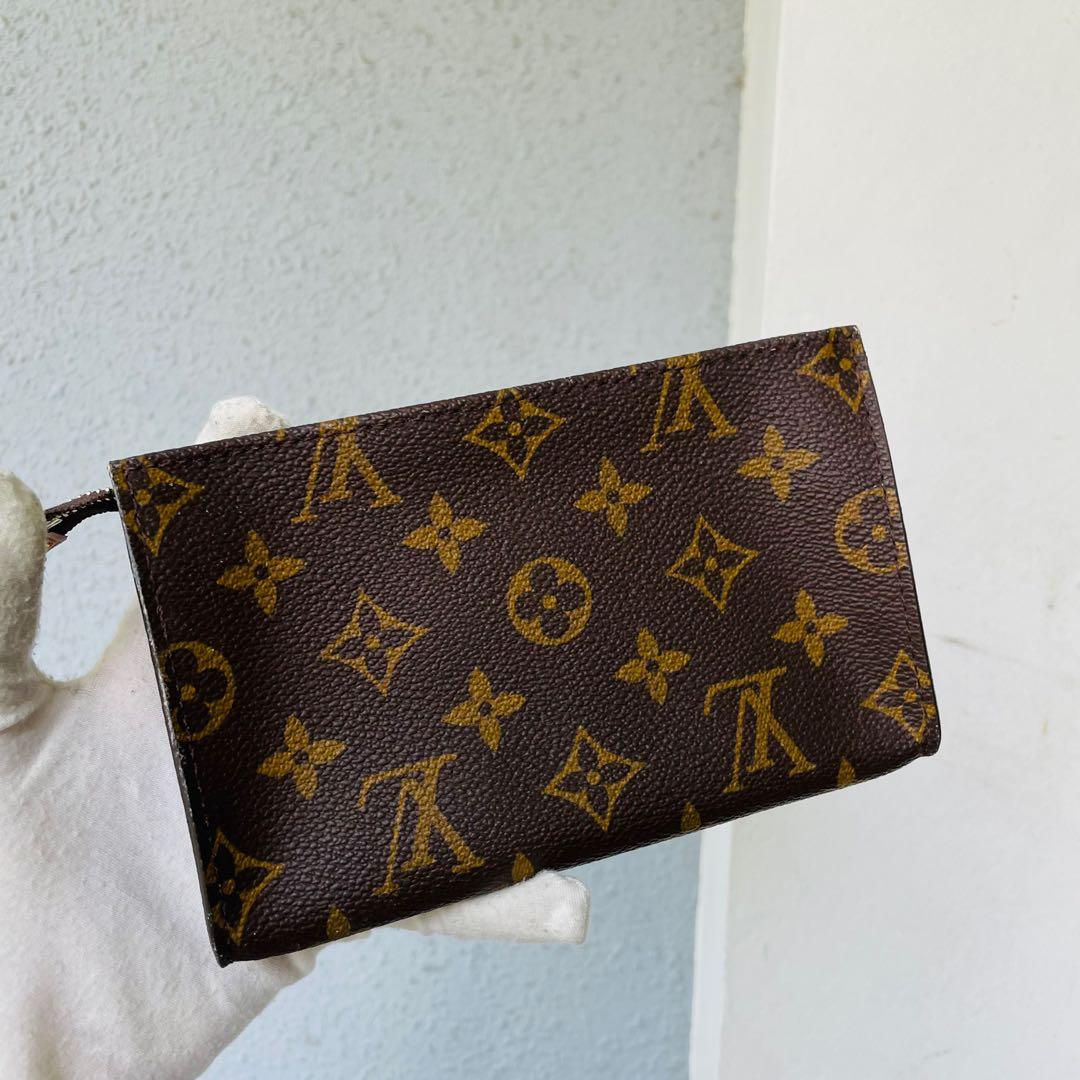 100% Authentic Louis Vuitton Poche Toilette NM, Luxury, Bags & Wallets on  Carousell