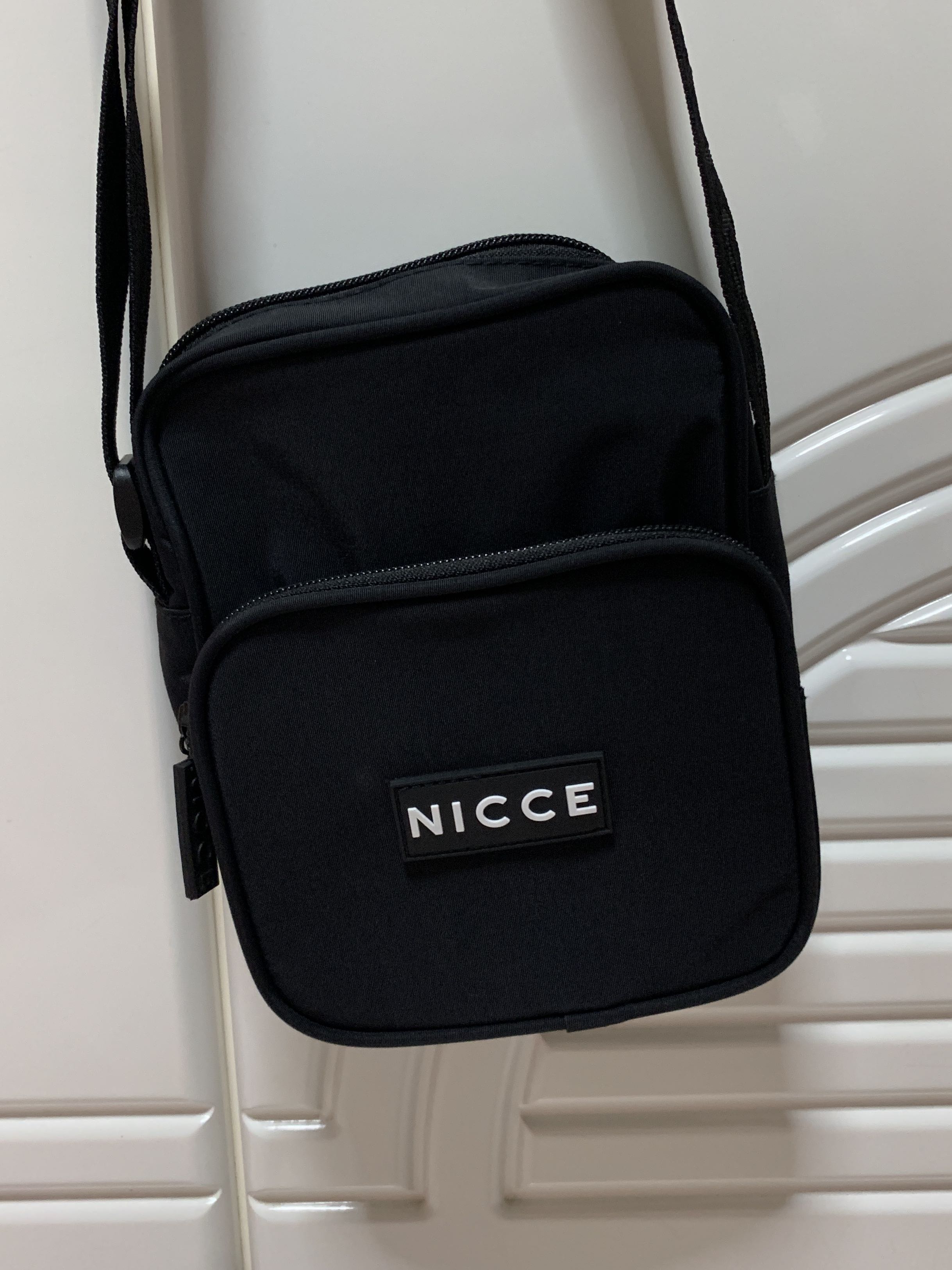 plain black sling bag