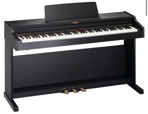 Piano Roland P301 black with Ivory feel keyboards Hobbies