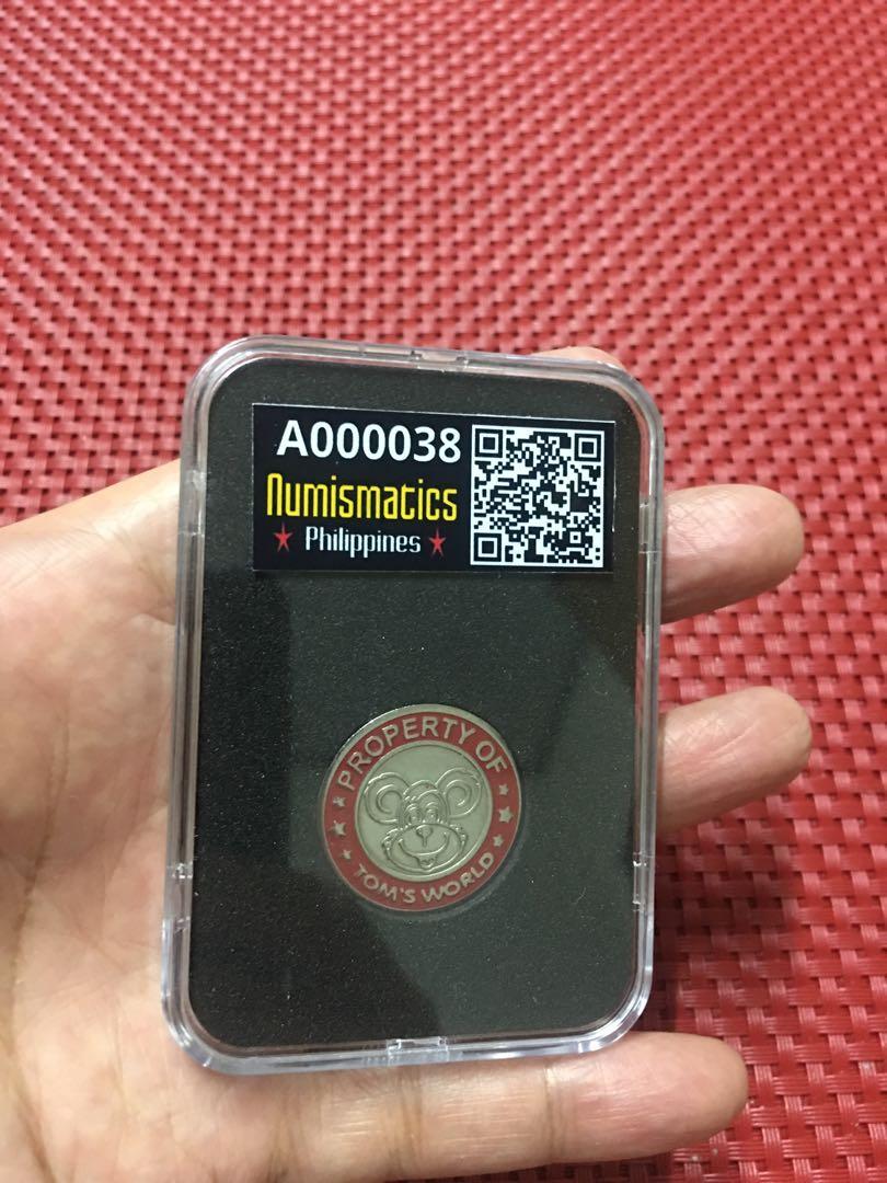 Tom's world red ring token, Hobbies & Toys, Memorabilia & Collectibles