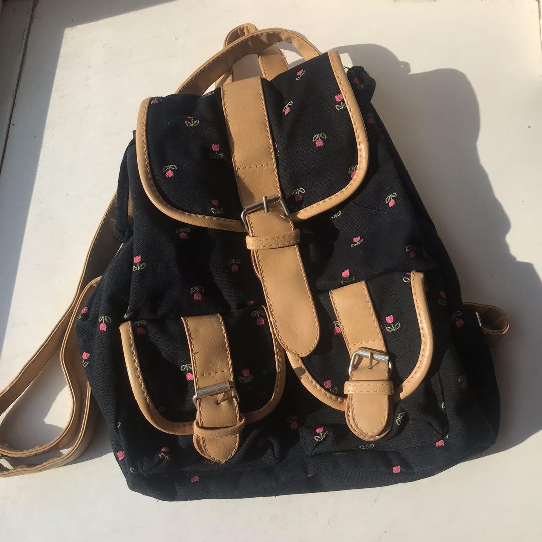 Black store floral backpacks