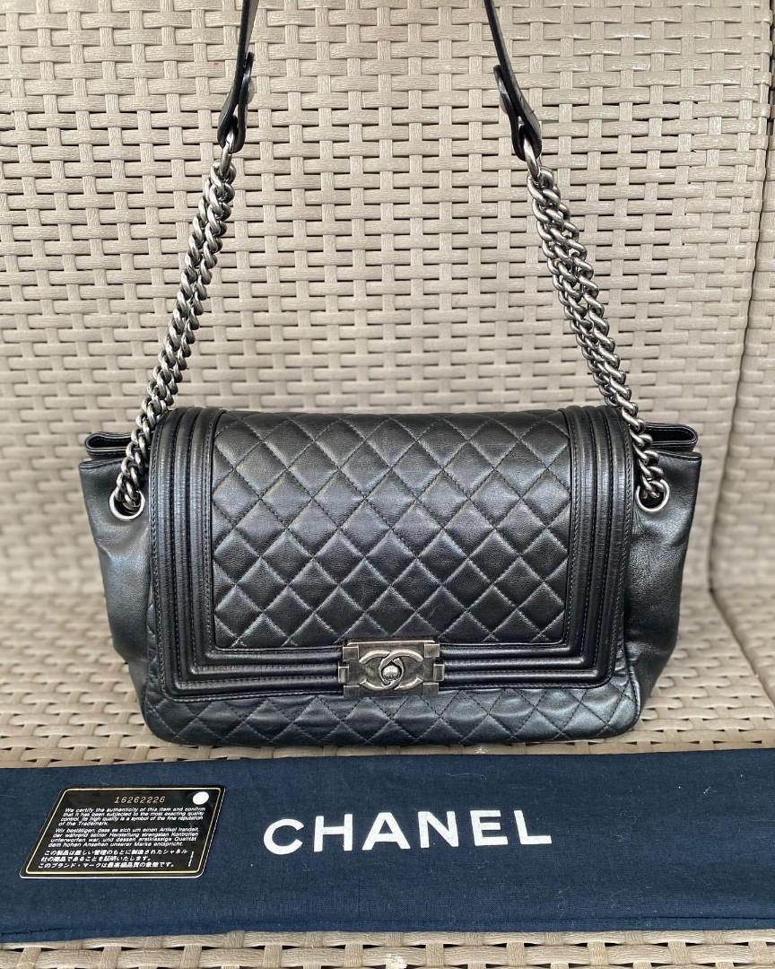 Chanel W/ card and Box Medium Enchained Boy flap bag Black Leather  ref.221486 - Joli Closet