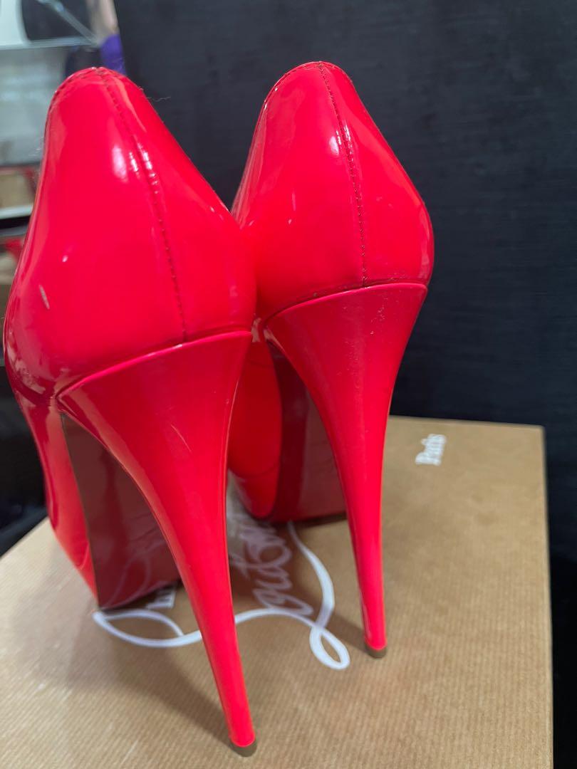 Louboutin shop rose fluo