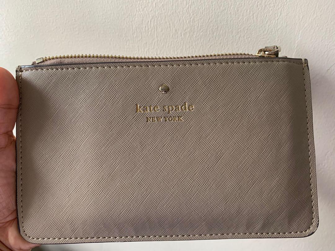 Kate Spade Pouch (Category: Luxury Bags & Wallets) located in Pasig City. Submitted by skylistings_c (Listing ID 1093985888, Image 3). Description: Never been used. Gift to me during Christmas Party kaso never ko nagamit. .