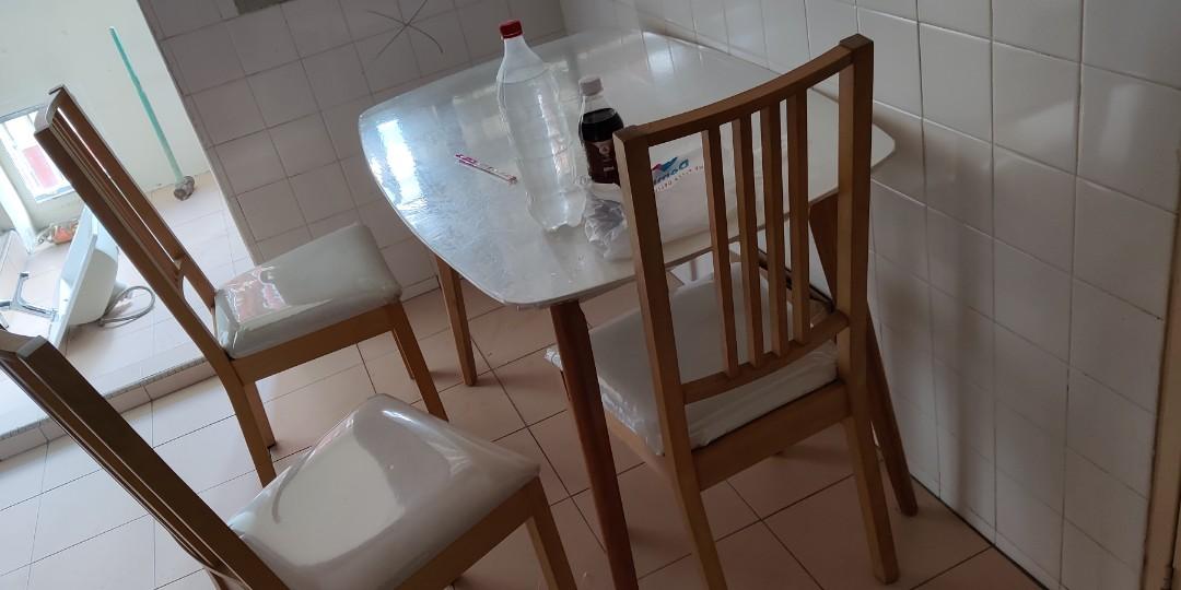 Dining table (Category: Tables & Sets) located in Singapore. Submitted by justforlaufs (Listing ID 1094144781, Image 1). Description: table + 3 chairs chair seats have been wrapped with plastic self pick up at tampines 520xxx.