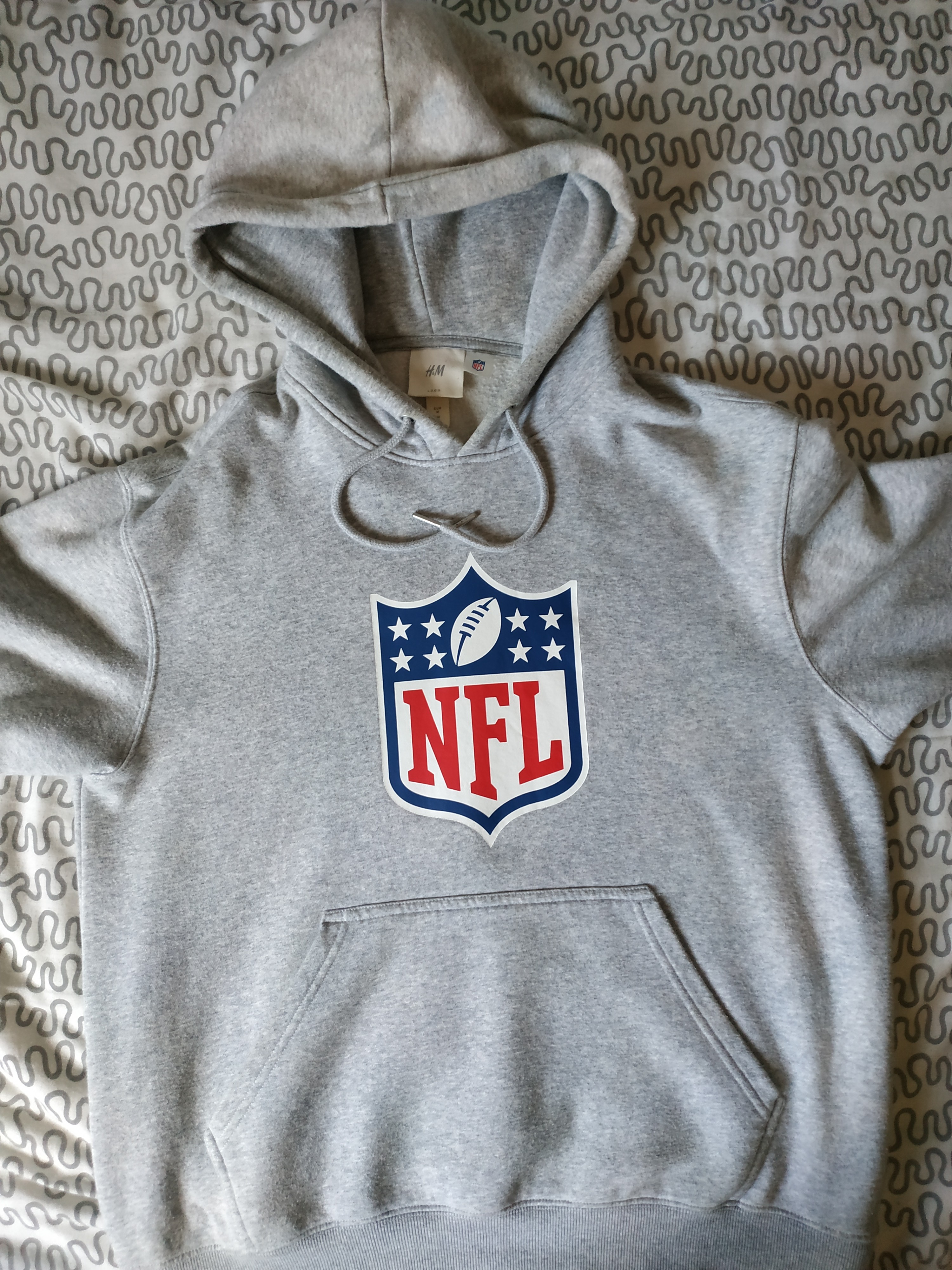 Official NFL Hoodie, Men's Fashion, Tops & Sets, Hoodies on Carousell
