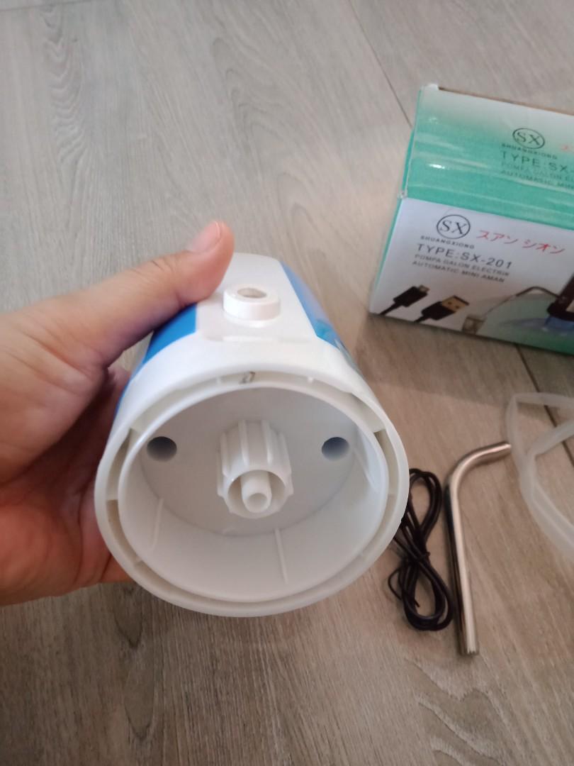 Smart rechargeable water pump for 5 gallon (Category: Water Bottles & Tumblers) located in Manila. Submitted by PickClickShip (Listing ID 1094162535, Image 3). Description: Rechargeable water pump for 5 gallon bottle. An easier way to get water from your 5 gallon bottle. no need to carry it on table top or chair. - rechargeable - simple to operate - power on and off button with light - easy to bring along on outing - included USB cable, stainless