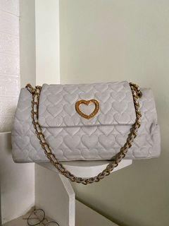 lovecat sling bolsa price