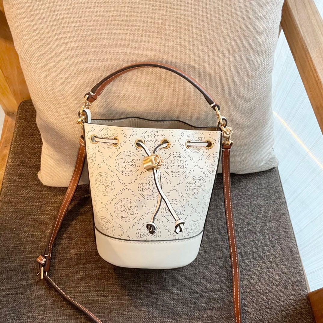 Tory Burch Fleming Soft Mini Bucket Bag, Women's Fashion, Bags & Wallets,  Tote Bags on Carousell