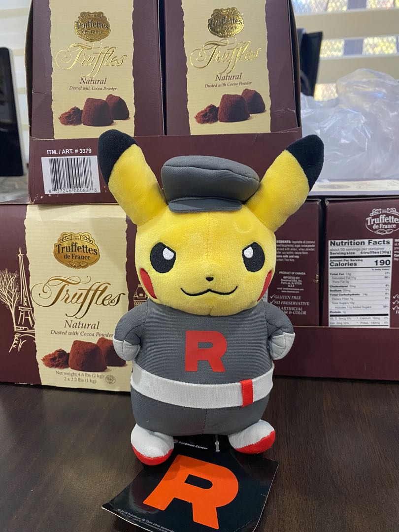 Team rocket 2025 pikachu plush