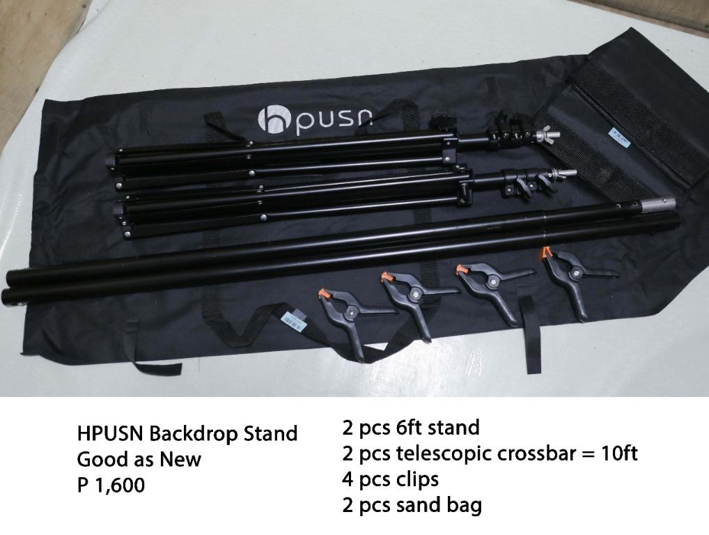 Backdrop / Background Stand For Sale (Category: Lighting & Studio Equipment) located in Pasig City. Submitted by lee025 (Listing ID 1094784359, Image 1). Description: PRICE DROP…PRICE DROP…PRICE DROP HPUSN Backdrop Stand Good as New 2 pcs 6ft stand 2 pcs telescopic crossbar = 10ft 4 pcs clips 2 pcs sand bag Before: P1,600 Now: P1,300 EMART 8.5x10 ft Backdrop stand Brand New 2 pcs 8.5ft stand 2 pcs telescopic crossbar = 10ft 2 pcs sand bag 4pcs Ba