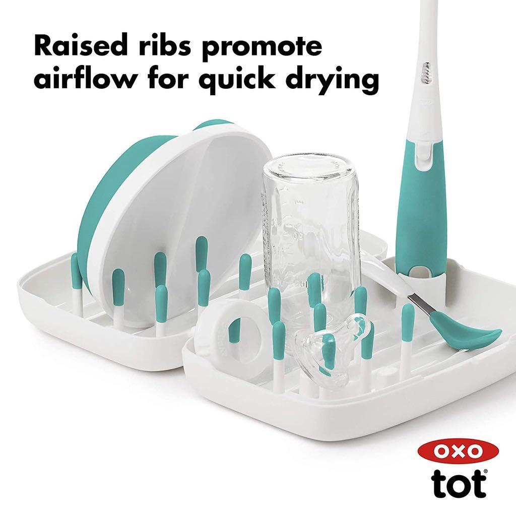 Portable Cleaning Bottle (Category: Other Babies Going Out Needs) located in San Pedro. Submitted by justforthrift (Listing ID 1094950418, Image 1). Description: Brand: Oxo Tot Description Now you can say good-bye to wet brushes and dirty bottles in inconvenient plastic bags! The OXO Tot On-the-Go Drying Rack and Bottle Brush is the all-in-one portable solution for cleaning and drying bottles, cups, nipples, pump parts and more. It opens up into 