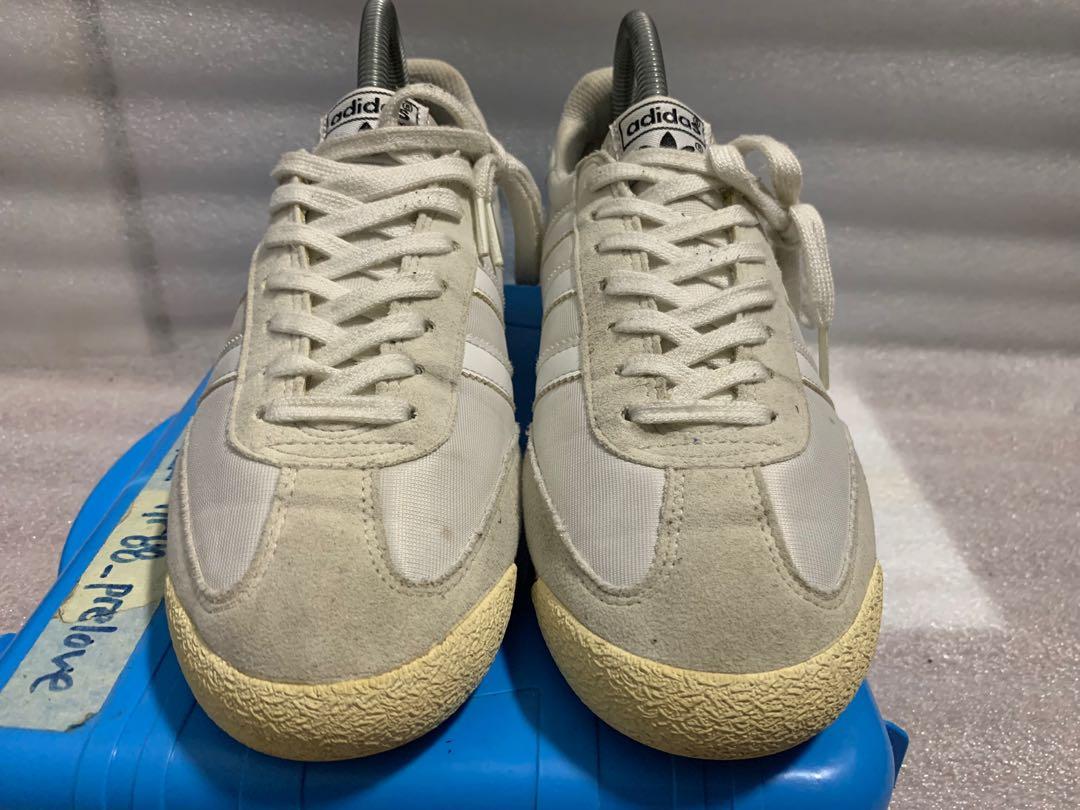 Adidas dragon triple white store