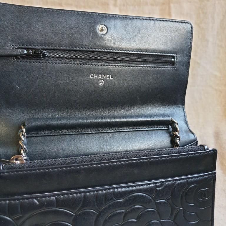 Chanel Black Lambskin Camellia Embossed Clutch Bag, Luxury, Bags