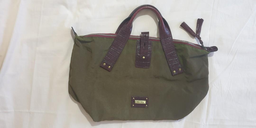 Fino Nylon Bag with Leather Trimmings (Category: Luxury Bags & Wallets) located in Makati City. Submitted by belle_ame_67 (Listing ID 1095115777, Image 2). Description: Authentic Fino Nylon Bag with Leather Trimmings With sign of usage RFS: Decluttering.