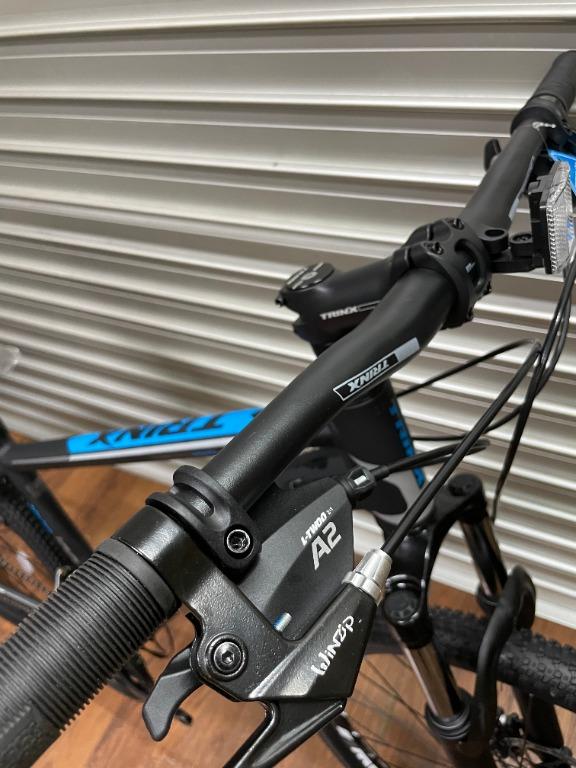 Trinx m100 hotsell handlebar size