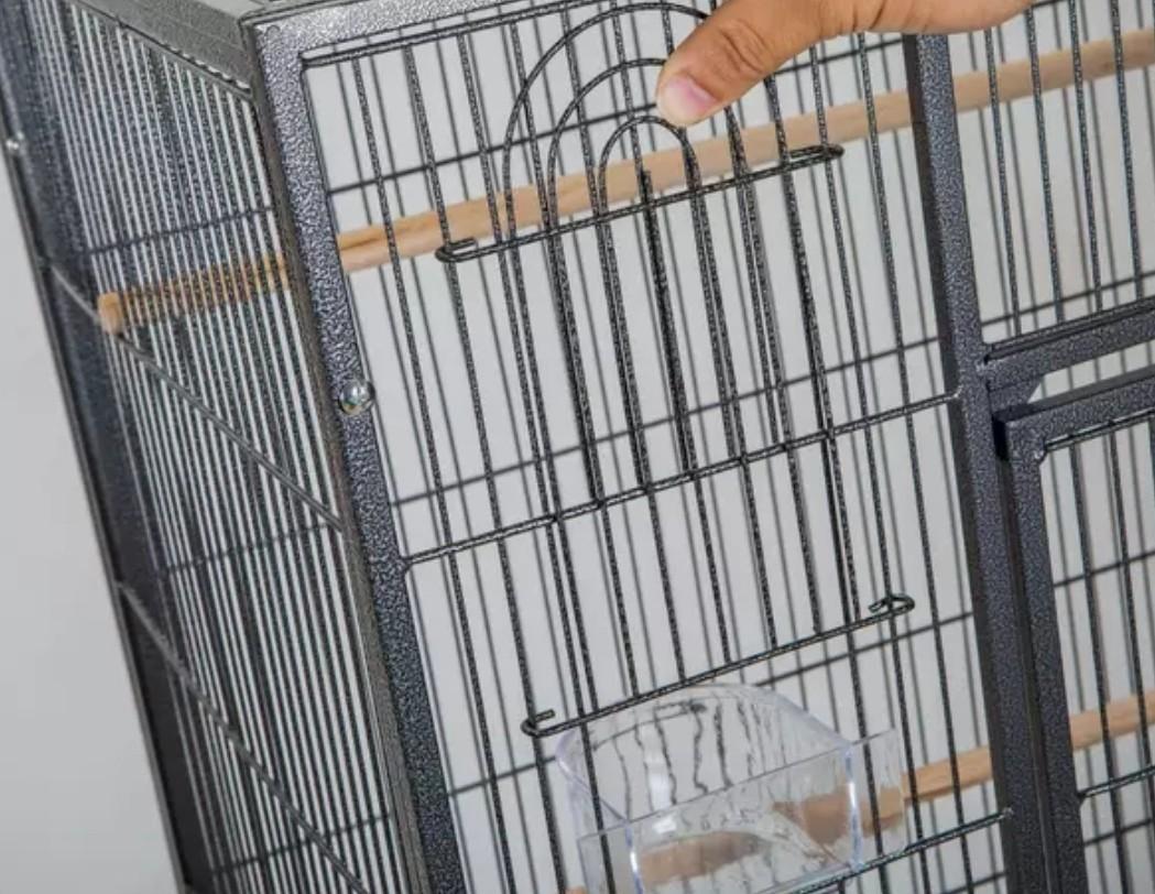 Bird cage . Hammer spray wrought iron bird cage of approx size