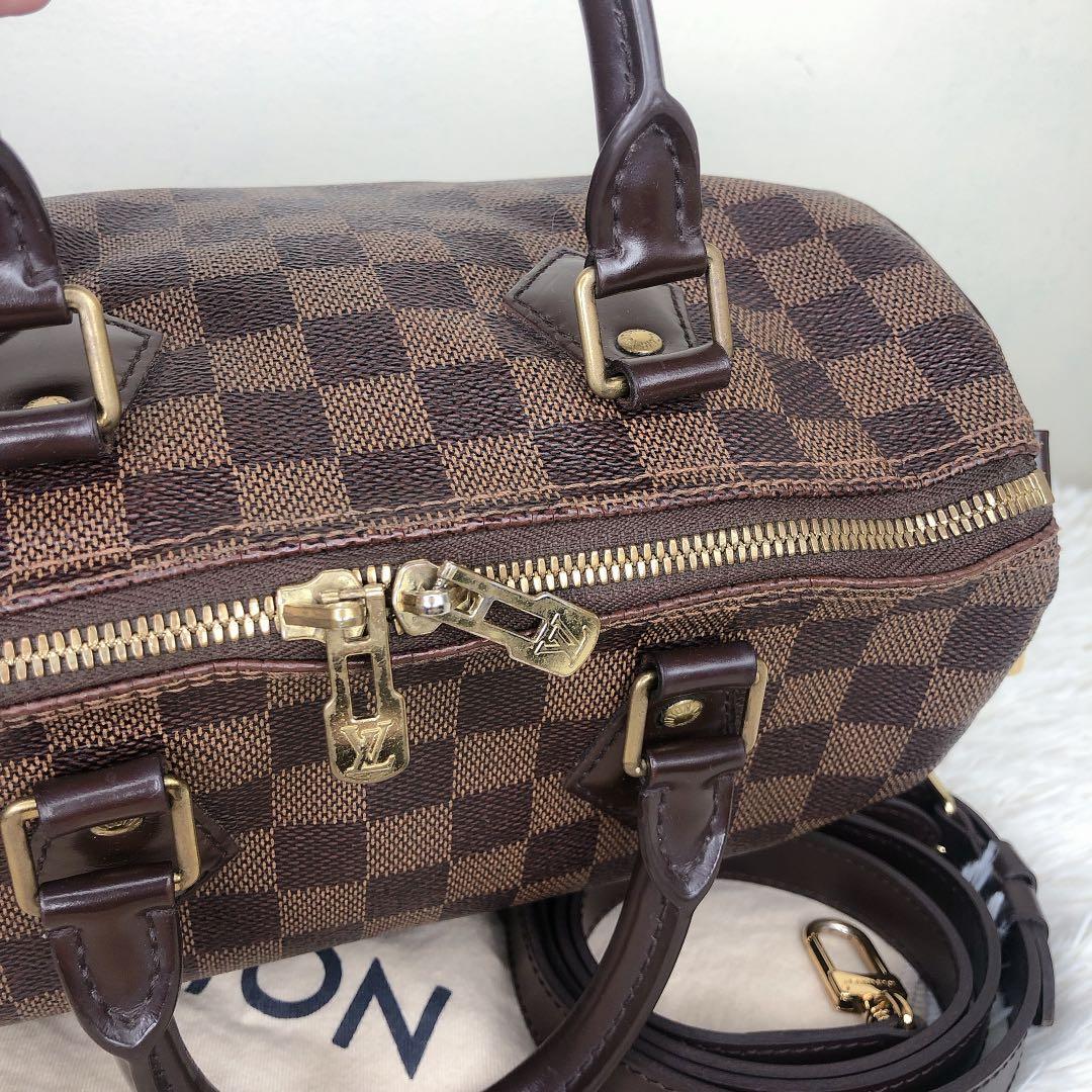 LV Speedy Bandouliere 25 (Category: Luxury Bags & Wallets) located in Quezon City. Submitted by theluxurycityph. (Listing ID 1091677518, Image 3). Description: 💯Authentic Louis Vuitton Speedy Bandouliere 25 comes with strap, dustbag and entrupy Rank ab ✔️open for meetup or shipping 𝗗𝗶𝘀𝗰𝗹𝗮𝗶𝗺𝗲𝗿 — TheLuxuryCityPH 𝗶𝘀 𝗻𝗼𝘁 𝗮𝘀𝘀𝗼𝗰𝗶𝗮𝘁𝗲𝗱 𝗼𝗿 𝗮𝗳𝗳𝗶𝗹𝗶𝗮𝘁𝗲𝗱 𝘄𝗶𝘁𝗵 𝗮𝗻𝘆 𝗼𝗳 𝘁𝗵𝗲 𝗯𝗿𝗮𝗻𝗱𝘀 𝗳𝗲𝗮𝘁𝘂𝗿𝗲𝗱. 𝗔𝗹𝗹 𝘁