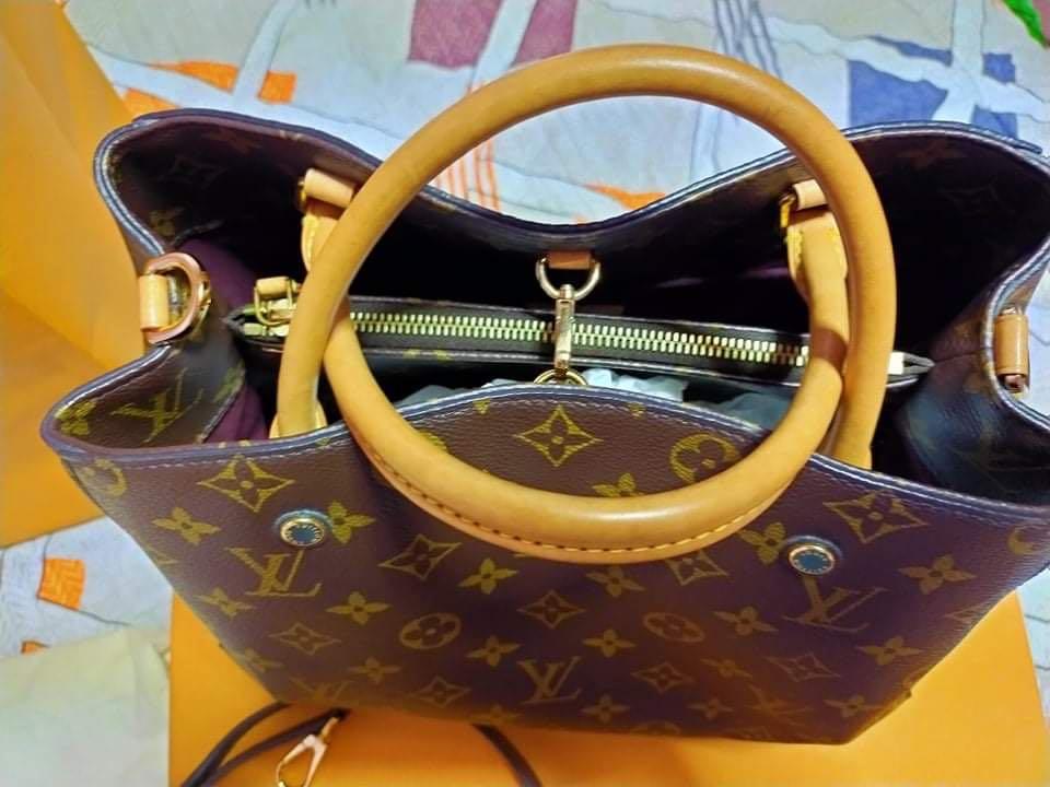 Authentic Louis Vuitton montaigne GM (Category: Luxury Bags & Wallets) located in Pasig City. Submitted by Watchaholics (Listing ID 1095434624, Image 3). Description: authentic LV montaigne mono GM Used once only 9/10 condition With receipt With serial code Paperbag Slightly neg.
