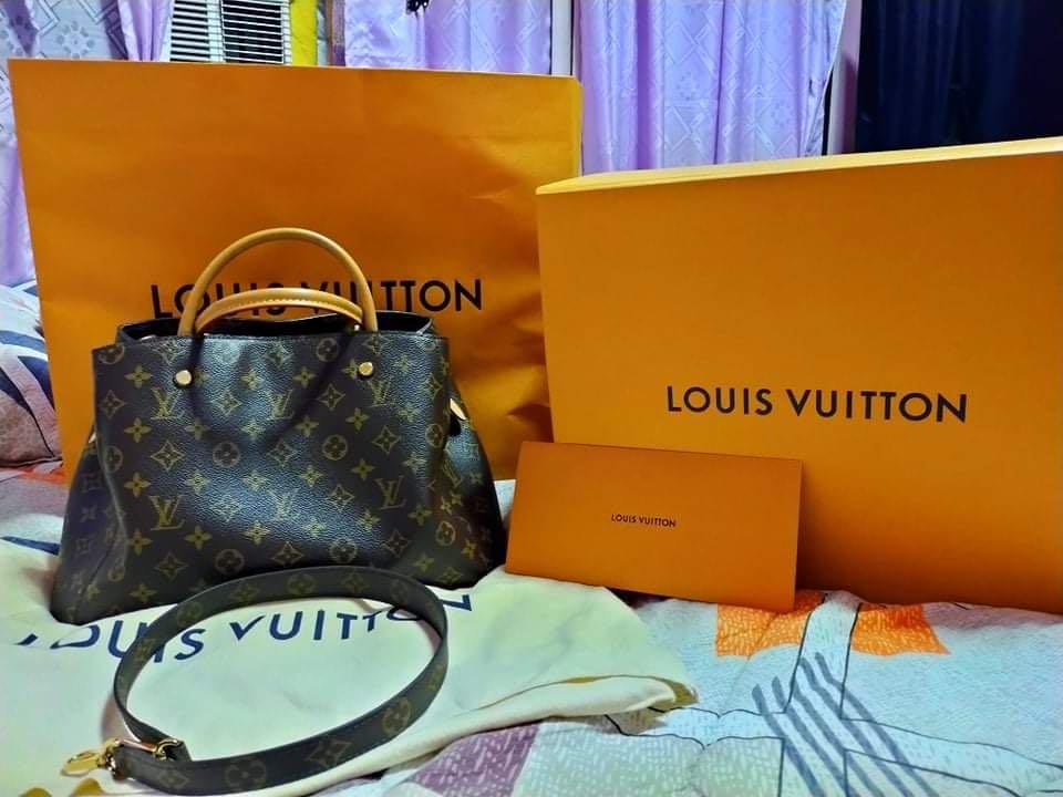 Authentic Louis Vuitton montaigne GM (Category: Luxury Bags & Wallets) located in Pasig City. Submitted by Watchaholics (Listing ID 1095434624, Image 1). Description: authentic LV montaigne mono GM Used once only 9/10 condition With receipt With serial code Paperbag Slightly neg.