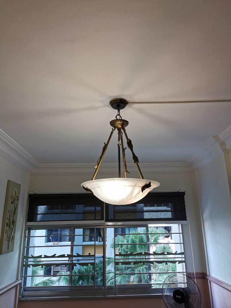 Ceiling lighting (Category: Lighting) located in Singapore. Submitted by graceng.hee (Listing ID 1095495441, Image 3). Description: Rustic ceiling lighting. Simple and unique design. Great for placement at dinning area. Comes with warm white light tone which gives a cosy warm ambience. Used 3 x E27 light bulbs. Well maintained. Can view from pictures. Self collect at Choa Chu Kang area..