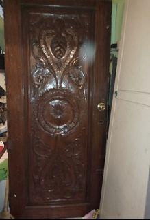 Main narra door with carving