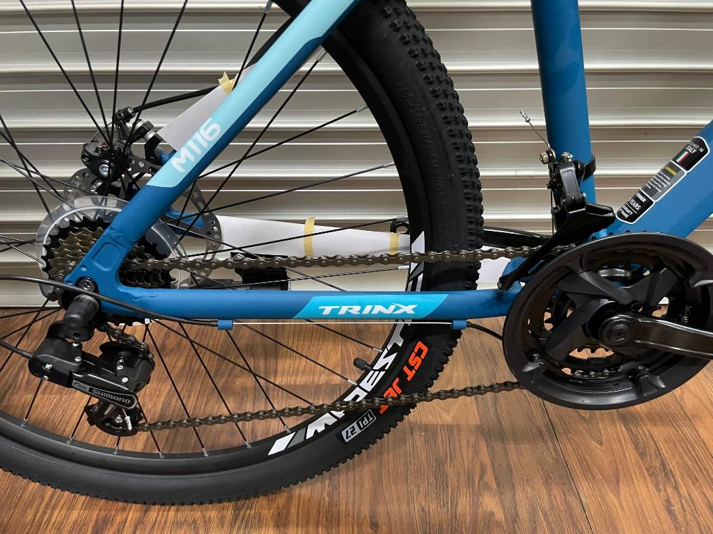 Trinx M116 26" Mountain Bike (Matt Blue White Blue) (Category: Bicycles) located in Singapore. Submitted by kshbicycles (Listing ID 1095601051, Image 3). Description: Frame material: alloy Frame Size: M Wheel size: 26" Shifter: Shimano FD: SunRun RD: Shimano Brake mechanism: Mechanical discbrake Comes with side stand Other colours available: Glossy Black Red White Tags: bicycle, cycling, cycle, hardtail, mtb, java, crolan, polygon, gt, giant, mer