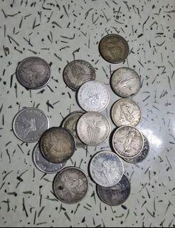 Im buying USPI silver coins 1903-1912 one peso coin
