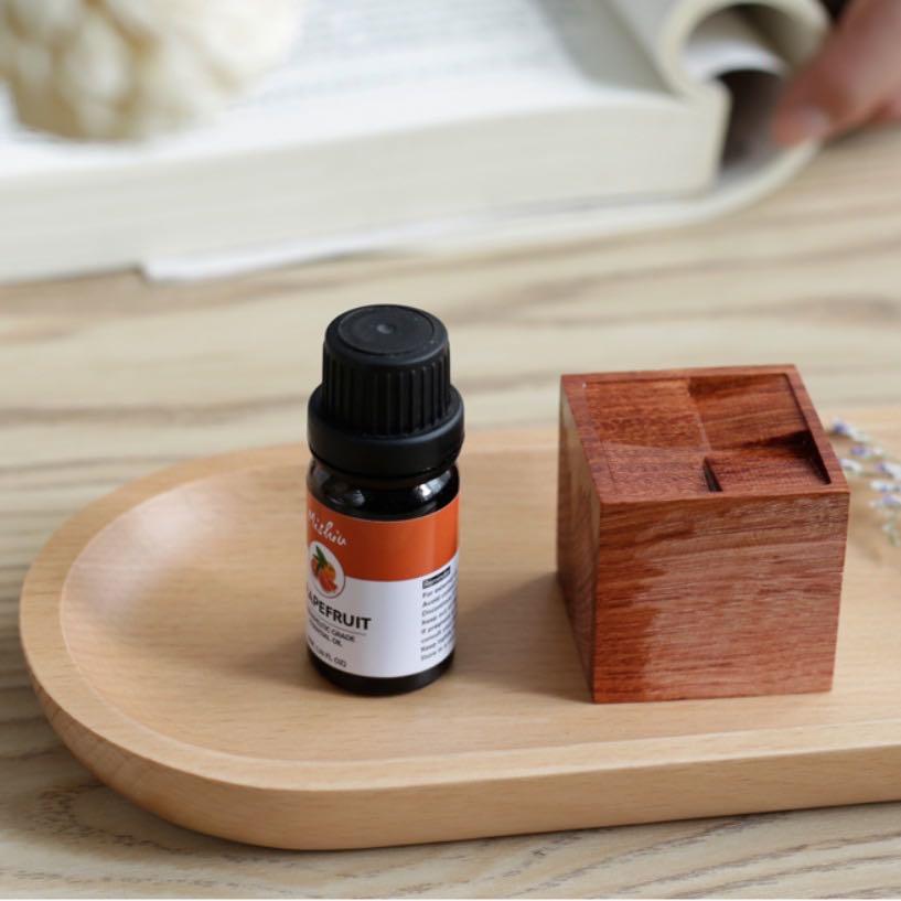 Cube Wood Diffuser (Category: Other Home Decor) located in Singapore. Submitted by weekendxproject (Listing ID 1095960767, Image 3). Description: Brand new Made of rose wood (essential oil not included) Measures 4 x 4cm Add a few drops of essential/aromatherapy oil onto the surface and the natural rose wood will diffuse the scent Inclusive of complimentary postage .