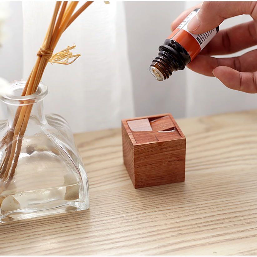 Cube Wood Diffuser (Category: Other Home Decor) located in Singapore. Submitted by weekendxproject (Listing ID 1095960767, Image 2). Description: Brand new Made of rose wood (essential oil not included) Measures 4 x 4cm Add a few drops of essential/aromatherapy oil onto the surface and the natural rose wood will diffuse the scent Inclusive of complimentary postage .