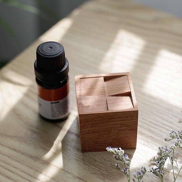 Cube Wood Diffuser (Category: Other Home Decor) located in Singapore. Submitted by weekendxproject (Listing ID 1095960767, Image 1). Description: Brand new Made of rose wood (essential oil not included) Measures 4 x 4cm Add a few drops of essential/aromatherapy oil onto the surface and the natural rose wood will diffuse the scent Inclusive of complimentary postage .