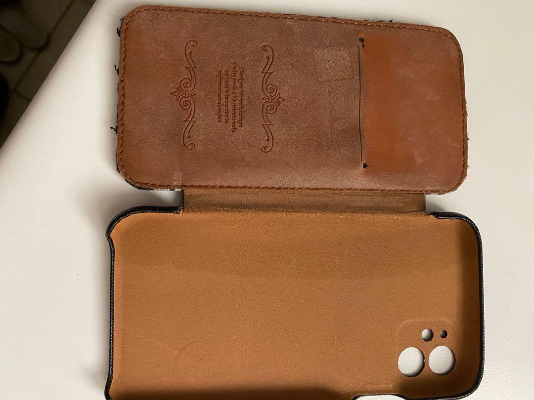 CD phone case (Category: Accessories) located in Richmond Hill. Submitted by ele30 (Listing ID 1096070575, Image 3). Description: It’s for an iPhone 11 (Christian Dior ) has credit card storage .