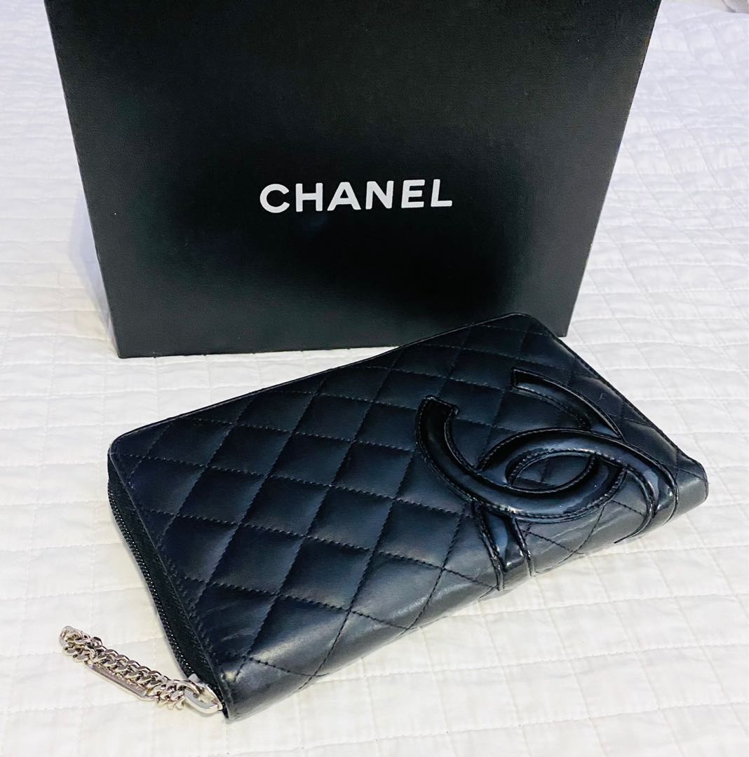 Wallet on chain leather mini bag Chanel Black in Leather  27553560