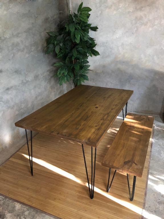 Modern Dining Table (Category: Tables & Sets) located in Pasig City. Submitted by holzph (Listing ID 1095929212, Image 1). Description: This custom dining table stands at 3ft wide x 5ft long. Showcasing its rustic yet modern designed hairpin legs, this table can sit 4-6 people. Table Measurement: Length: 152cm / 5ft Width: 91cm / 3ft Height: 76cm / 30” Thickness: 3.8cm / 1.5” Bench Measurements: Length: 146cm / 4’10” Width: 38cm / 15” Height: 46c