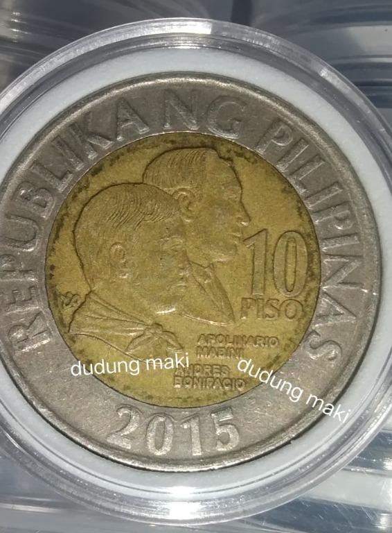 Error Coin 10 piso (Category: Currency) located in Davao. Submitted by maki.thrift (Listing ID 1096164040, Image 2). Description: Error - Machine Doubling.