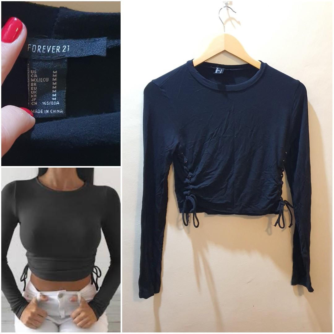 Forever21 Black Crop Top Long Sleeves (Category: Longsleeves) located in Angeles City. Submitted by declutt.rwithme (Listing ID 1096267880, Image 1). Description: never worn pero nalabhan na to no flaws stretchable bought this in US.