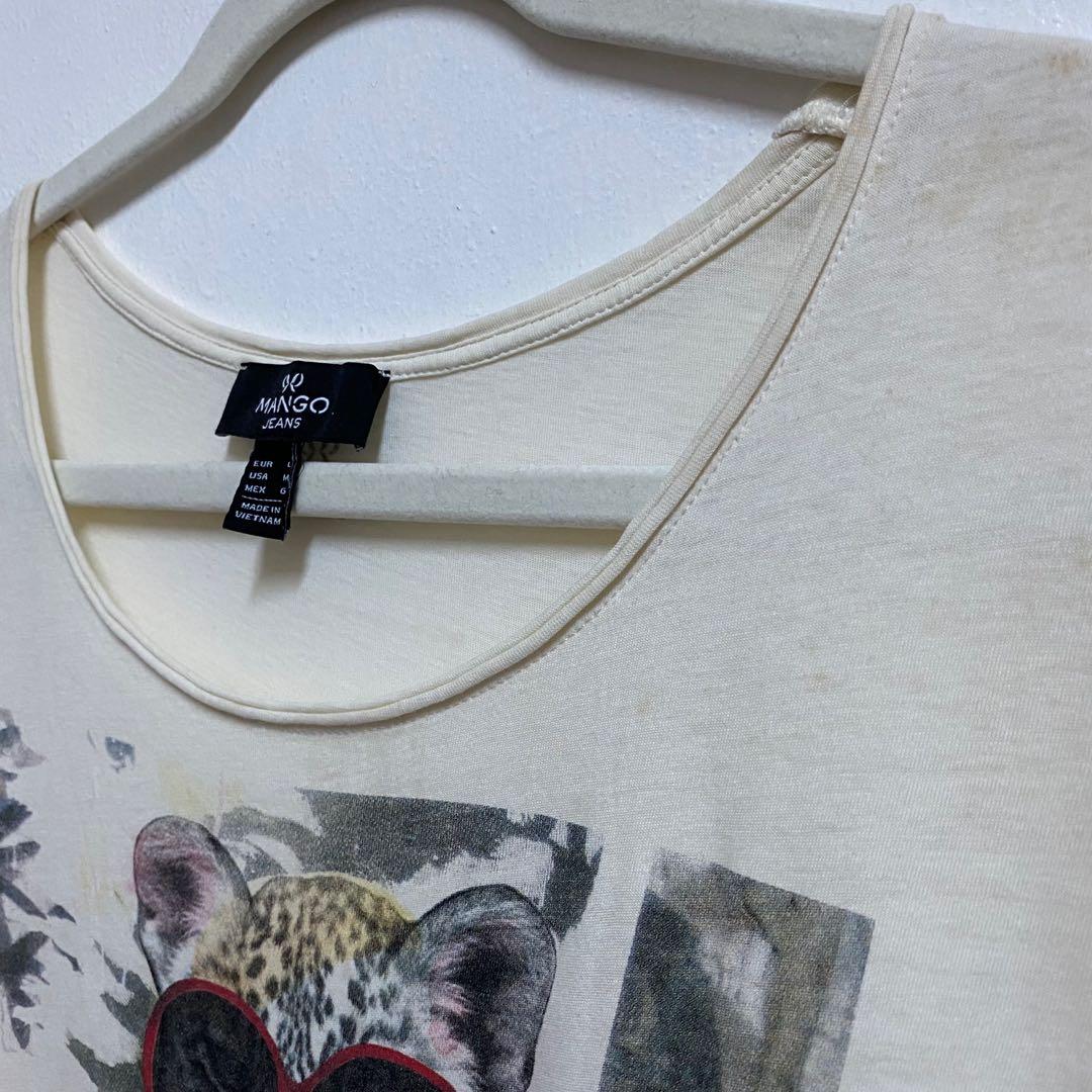 MANGO Graphic Vintage Print Shirt (Category: Shirts) located in Angeles City. Submitted by chaqi (Listing ID 1096224912, Image 2). Description: ✨ decluttering sale ✨ MANGO Graphic Vintage Print Shirt very light and breathable material flaws: stains (see photo).
