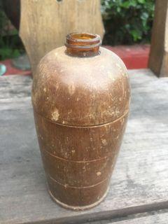 Old Perfume Bottle with wood
