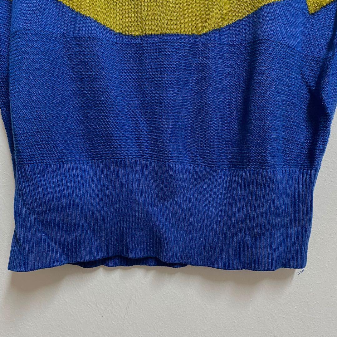 Retro Smiley Navy Knit Sweater (Category: Longsleeves) located in Angeles City. Submitted by chaqi (Listing ID 1096215408, Image 2). Description: ✨ decluttering sale ✨ Retro Smiley Design Navy Knit Sweater bought overseas brandless unique fit cinch like garter detail cut sleeves cut to a fitted fabric towards the end flaws: none.