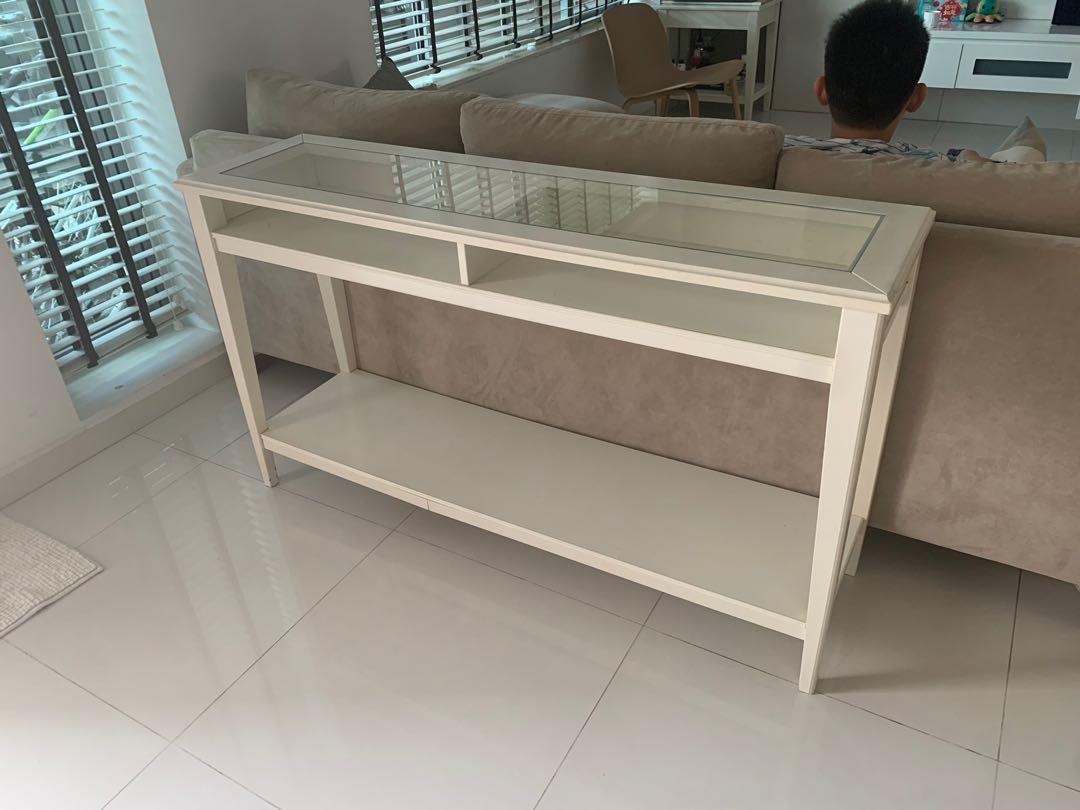 Console Table (Category: Tables & Sets) located in Singapore. Submitted by invictusin (Listing ID 1096296374, Image 1). Description: IKEA console table. Slight crack at the bottom but still in good working condition. Self collect .