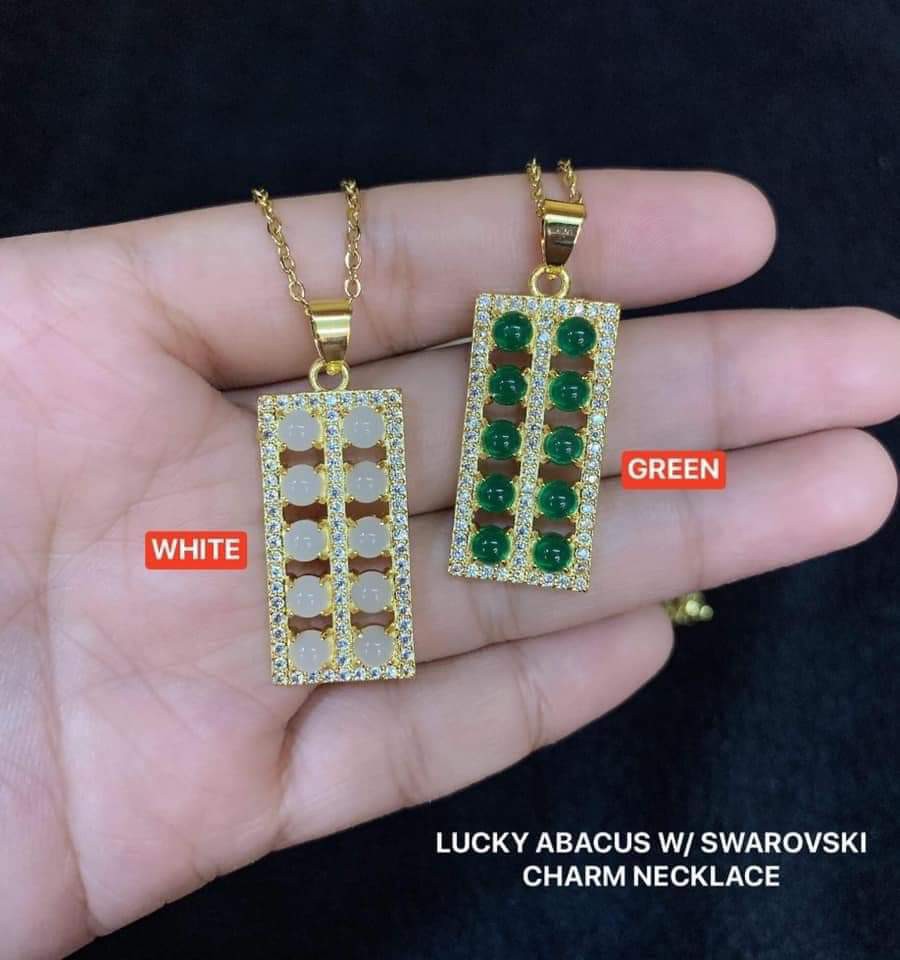 Swarovski lucky charm necklace hot sale