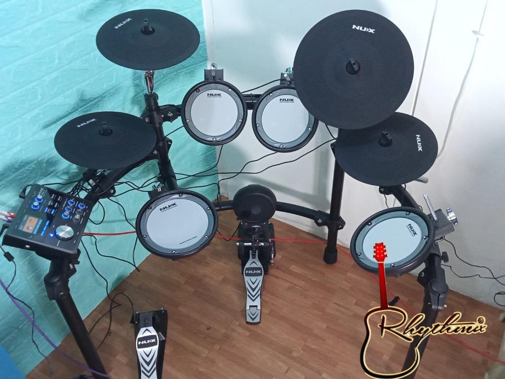 Nux DM7 Digital Drum Kit (Category: Musical Instruments) located in San Pedro. Submitted by rhythmix_enterprises (Listing ID 1096349880, Image 1). Description: "DM-7 Full Mesh Drum DM-7 is a professional electronic drum with full mesh drum. 30 independently sampled preset drum kits and 5 types of coaching functions. Simple and intuitive host interface with a customizable sound bank to ensure you have the most realistic drum sounds. With responsiv