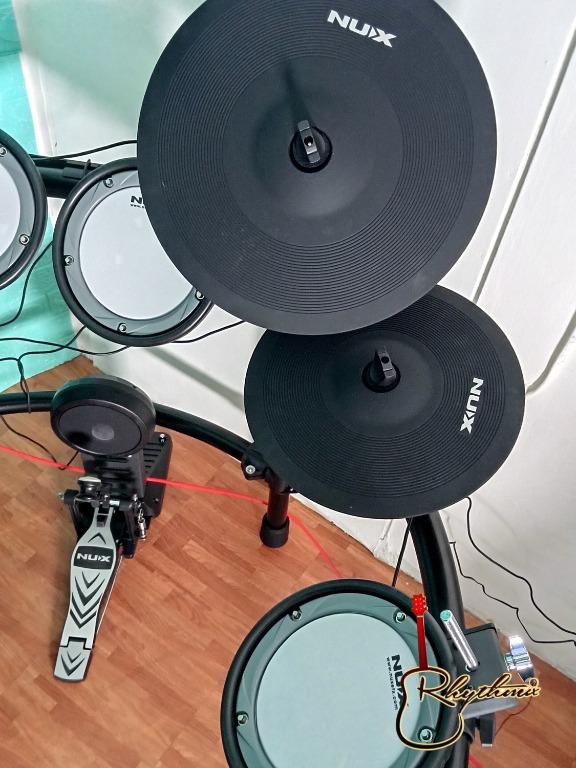 Nux DM7 Digital Drum Kit (Category: Musical Instruments) located in San Pedro. Submitted by rhythmix_enterprises (Listing ID 1096349880, Image 3). Description: "DM-7 Full Mesh Drum DM-7 is a professional electronic drum with full mesh drum. 30 independently sampled preset drum kits and 5 types of coaching functions. Simple and intuitive host interface with a customizable sound bank to ensure you have the most realistic drum sounds. With responsiv