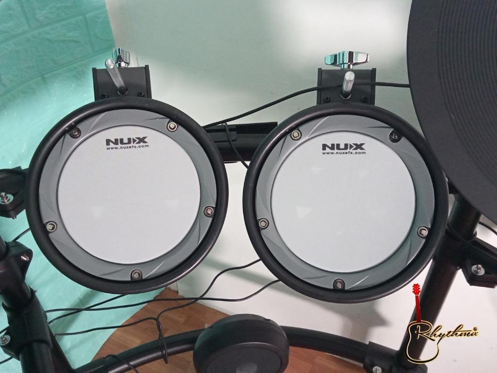 Nux DM7 Digital Drum Kit (Category: Musical Instruments) located in San Pedro. Submitted by rhythmix_enterprises (Listing ID 1096349880, Image 2). Description: "DM-7 Full Mesh Drum DM-7 is a professional electronic drum with full mesh drum. 30 independently sampled preset drum kits and 5 types of coaching functions. Simple and intuitive host interface with a customizable sound bank to ensure you have the most realistic drum sounds. With responsiv
