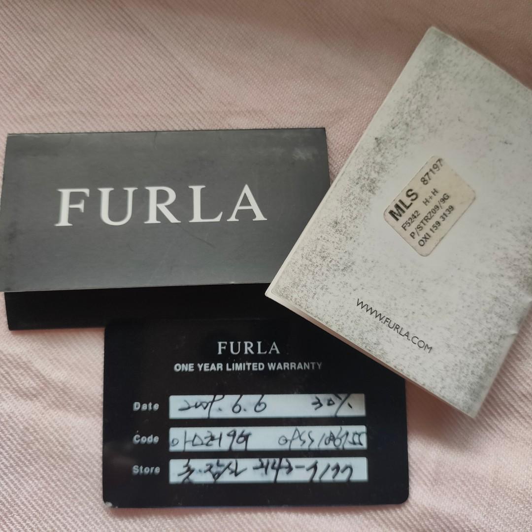 Furla Ostrich Leather Red 3-way (Category: Shoulder Bags) located in Muntinlupa City. Submitted by cassava_ph (Listing ID 1096371702, Image 3). Description: Authentic Furla - 3-way: expandable handbag, shoulder bag, sling bag - With code and authenticity cards - size large : 18.5x11x7inches - excellent hardwares - adjustable sling - normal usage signs on handle but intact rubber lining, in sturdy condition. please feel free to pm me :)).