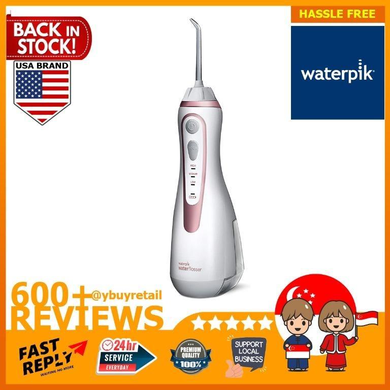 waterpik usa cordless water flosser rechargeable portable oral irrigator for travel and home cordless advanced wp 569 rose gold everything else on carousell