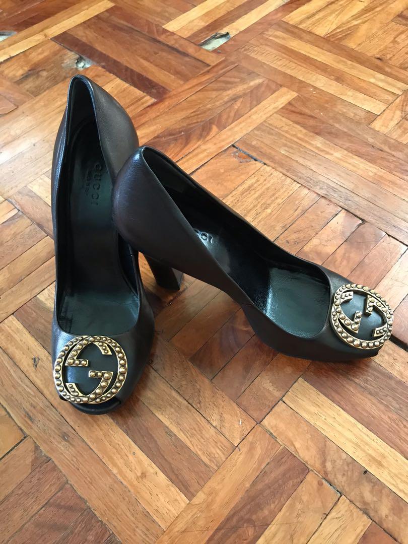 Gucci peep toe block heel (Category: Sneakers & Footwear) located in Paranaque City. Submitted by superpeanut (Listing ID 1096746719, Image 1). Description: Gucci block heel, peep toe, studded GG pumps 100% authentic Brown leather 35.5 (22.5cm insole) 3 inch heels Barely noticeable rubmarks on the sides and soles. Clean inside and out. No more inclusions except dust bag. Bought in the US. BPI deposit only LBC only.