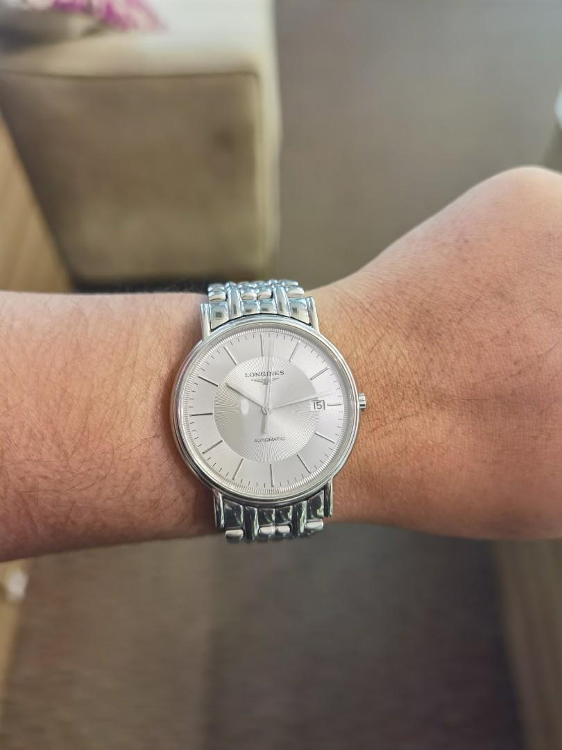 Prelove Longines (Category: Luxury Watches) located in Taguig. Submitted by mhalet.902 (Listing ID 1096761320, Image 1). Description: Gender: Men's Reference #: L4.801.4 Movement: Automatic Case Size: 38mm Case Material: Stainless steel Strap Size: 5.75" Crystal: Sapphire Dial Type/Color: Analog / Silver Water Resistance: 30m Calendar: Date display Band Type: Bracelet Band Material: Stainless steel Clasp: Butterfly Inclusion: None Detailed Item D