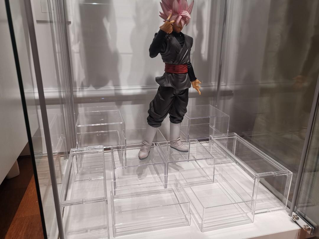 Figure stand base clearance