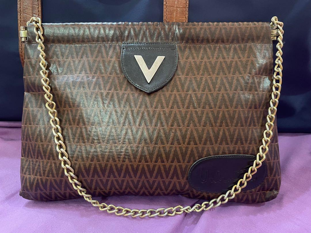 Valentino Clutch with chain sling (Category: Luxury Bags & Wallets) located in Quezon City. Submitted by thrift_saver07 (Listing ID 1097009487, Image 1). Description: Valentino Clutch bag with custom chain to make it shoulder bag..